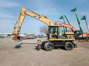 lot 6 image: 2002 Cat Model M315 Wheeled Excavator