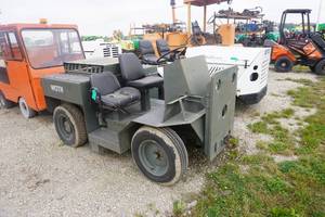 lot 26 image: Army Green X3-WT Airport Gas Powered Tow Tractor
