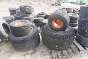 lot 29 image: Full Set Titan & Goodyear Tractor Turf Tires