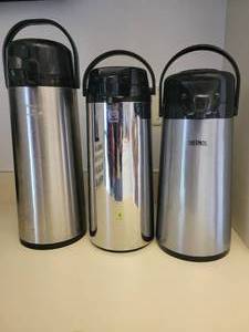 lot 36 image: A set of 3 pump thermoses.