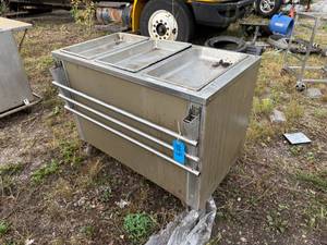 lot 21 image: WARMING TABLE