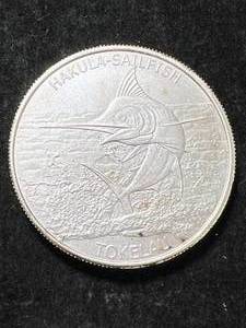 lot 08 image: 1 TROY OZ .999 FINE SILVER 2016 TOKELAU ROUND