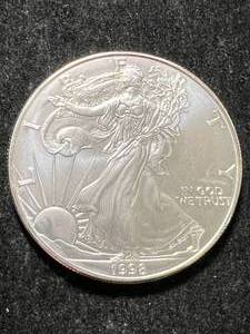 lot 32 image: 1998 AMERICAN SILVER EAGLE 1 TROY OZ .999 FINE SILVER