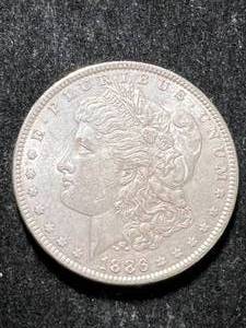 lot 34 image: 1886 US MORGAN SILVER DOLLAR