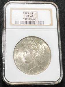 lot 58 image: 1923 US PEACE SILVER DOLLAR NGC MS64