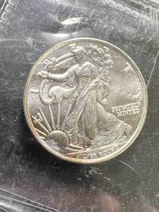lot 60 image: 14TH TROY OZ .999 FINE SILVER WALKING LIBERTY ROUND