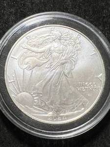 lot 76 image: 2024 AMERICAN SILVER EAGLE 1 TROY OZ .999 FINE SILVER IN AIRTITE