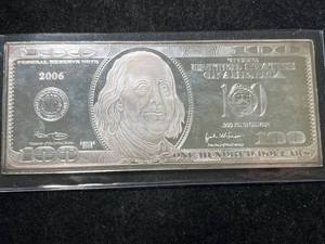 lot 92 image: 4 TROY OZ .999 FINE SILVER $100 BILL DESIGNED BAR