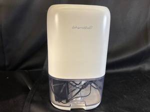 lot 39 image: Compact Electric Dehumidifier with Power Adapter