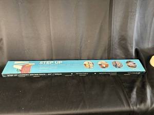 lot 63 image: Step Up Laundry Drying Rack, 40 Inch Retractable