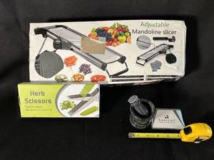 lot 64 image: Mandoline Slicer, Herb Scissors, Mortar & Pestle, Tape Measure Kitchen Lot