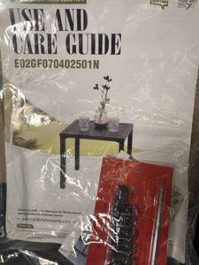 lot 124 image: Boxed Outdoor Patio Table with Hardware and Instructions