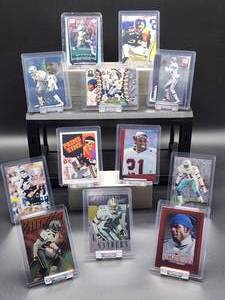 lot 43 image: (12) Assorted Vintage FalconsCowboys HOF Great Prime Time Deion Sanders Football Cards