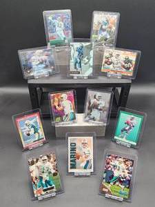 lot 75 image: (12) Assorted Dolphins HOF Great Dan Marino NFL Football Cards