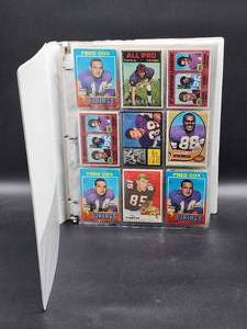 lot 108 image: Binder with Assorted Vintage Minnesota Vikings Football Cards and Minnesota North Star Hockey Cards