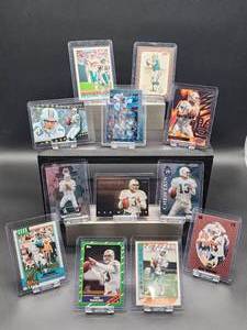 lot 99 image: (12) Assorted Dolphins HOF Great Dan Marino NFL Football Cards