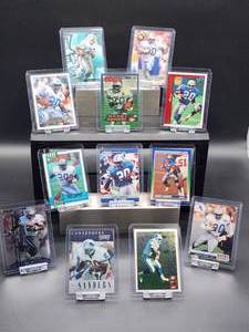 lot 100 image: (12) Assorted Lions HOF Great Barry Sanders NFL Football Cards