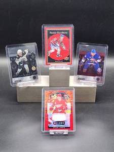 lot 136 image: (3) Assorted Limited Edition & (1) Game Used Jersey NHL Hockey Cards