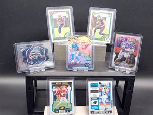 lot 153 image: (7) Assorted NFL Player Rookie Cards