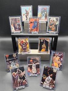 lot 172 image: (12) Assorted Years Vintage Lakers HOF Great Shaquille ONeil NBA Cards