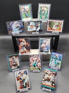 lot 141 image: (12) Assorted Dolphins HOF Great Dan Marino NFL Football Cards