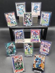 lot 127 image: (12) Assorted Lions HOF Great Barry Sanders NFL Football Cards