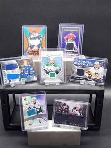 lot 186 image: (7) Assorted NHL Hockey Jersey Cards