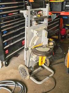 lot 23 image: DeWalt 12 Compound Miter Saw DW705 with Ridgid MS-UV Miter Saw Utility Vehicle