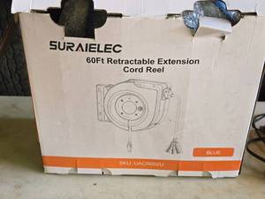 lot 32 image: Suraielec 60 Retractable Extension Cord Reel (New Old Stock)