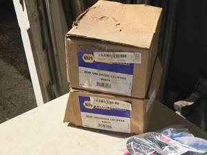 lot 60 image: Lot of (2) NAPA DOM Unloaded Calipers N4674 (in original packaging)