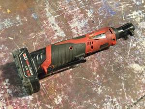lot 94 image: Milwaukee 12V Ratchet with Battery