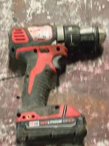 lot 100 image: Milwaukee 18V 12 (13mm) DrillDriver 2606-20 with M18 Red Lithium CP 2.0 Battery Pack