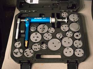 lot 107 image: Ares Pneumatic Brake Caliper Wind Back Tool Set 23-piece #18023 with Case
