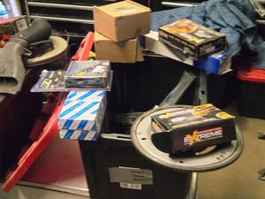 lot 347 image: Lot of (1 Bin) Exhaust Parts, Brake Parts, Axle, Battery Insulation Kit