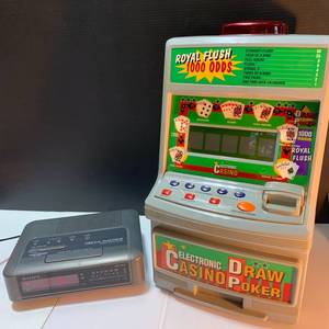lot 44 image: Casino Draw Poker Toy, Sony Dream Machine
