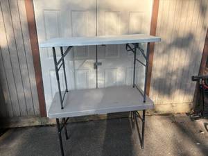 lot 23 image: Two Folding Tables