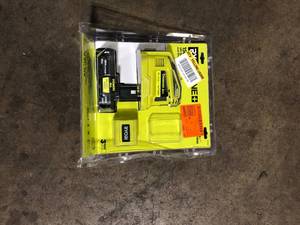 lot 64 image: RYOBI 18V ONE 150-Watt Portable Battery Inverter Power Source and Charger for 18V ONE Batteries with 2.0Ah BatteryCustomer Returns See Pictures