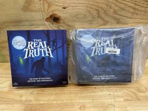 lot 218 image: Lot of 2 - Goliath The Last Podcast on The Left Presents The Real Truth - Strategy Game of World Conspiracy Theories and Mysteries with Over 300 Components - Ages 14 and Up, 2-5 Players