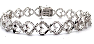 lot 41 image: 0.25 Carat Natural Diamond Heart Halo Link Bracelet VIDEO