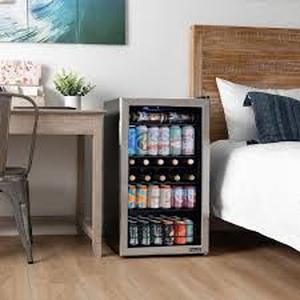 lot 45 image: NewAir 19 in. Single Zone 126 (12 oz.) Cans, Beverage and Wine Cooler Fridge with Flip Shelf, in Stainless Steel  Customer Returns See Pictures