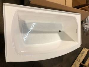 lot 13 image: American Standard Ovation Curve 60 in. x 30 in. Soaking Bathtub with Right Hand Drain in Arctic White Damaged   Customer Returns See Pictures