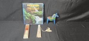 lot 113 image: Hawaii Big Island Book, Painted Horse Figurine, and Decorative Hand Fan Set