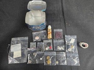 lot 131 image: Vintage Sewing Notions Collection with Buttons, Tin, and Accessories