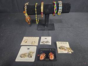 lot 135 image: Assorted Vintage Costume Jewelry Lot with Bracelets and Clip-On Earrings - display not inc