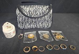 lot 136 image: Assorted Costume Rings with Mini Ceramic Holder and Zebra Print Bag