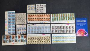 lot 183 image: Collection of Unused US Postage Stamp Sheets with Stamp Collecting Guide