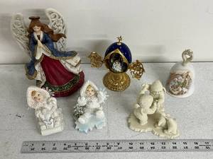lot 34D image: Collection of Holiday Figurines and Decor Including Angel, Nativity Egg, Bells, and Winter Children