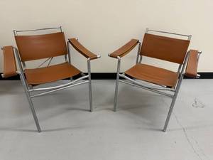 lot 38G image: Pair of Mid-Century Modern Chrome and Leather Arm Chairs