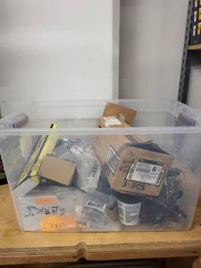 lot 8RC image: Large Lot of Plumbing Parts and Supplies with Vacuum Breakers, Putty, and Fittings