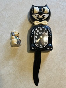lot 11C image: Kit Cat Klock Black Wall Clock and Maneki Neko Cat Figurine Set